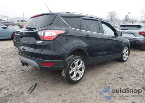 2018 Ford Escape Titanium z USA, uszkodzony, nr VIN 1FMCU9J95JUD15790